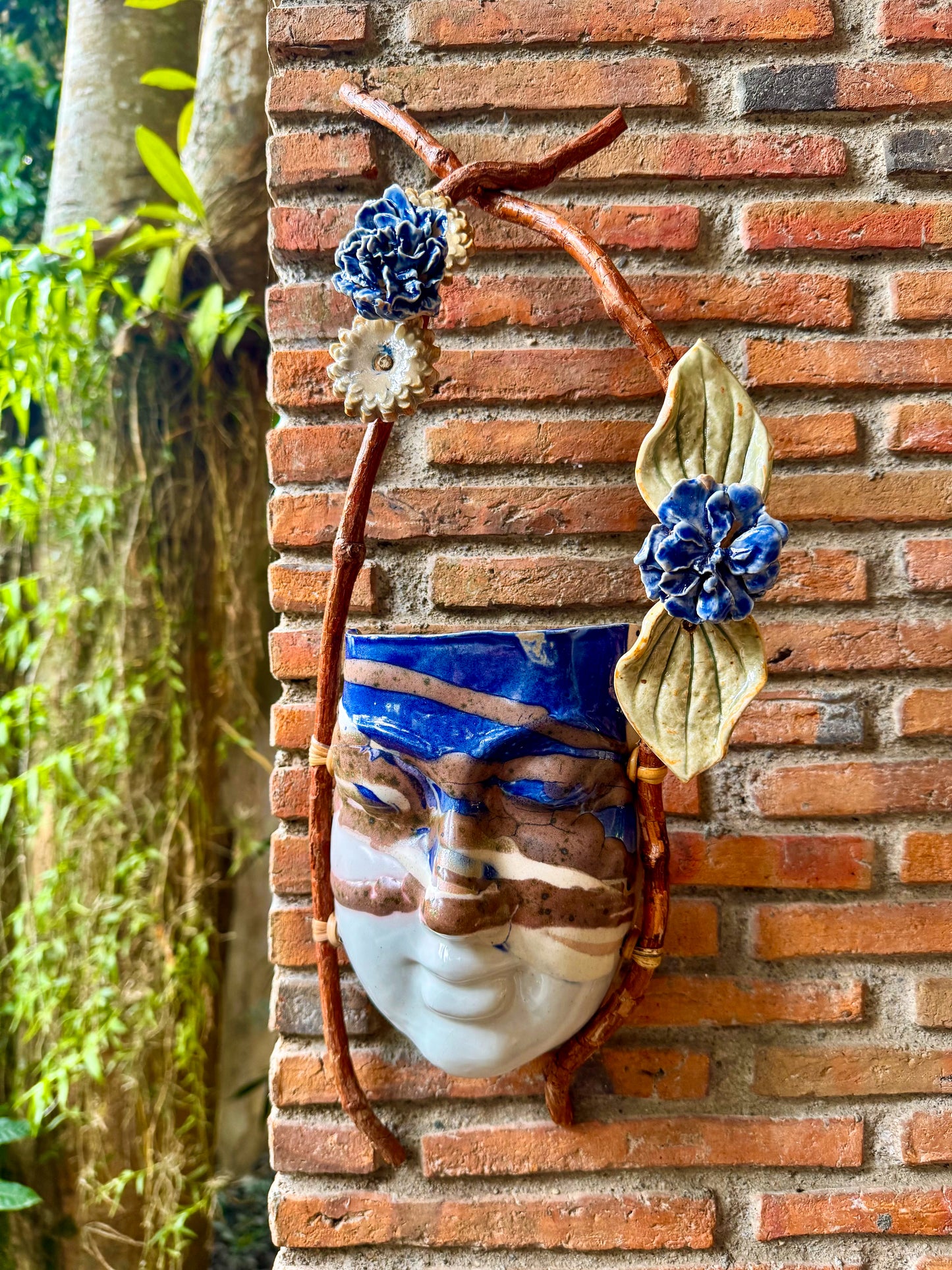 Mask w/ Flowers Wall Hang (Blue & Reddish Brown on White Glaze)