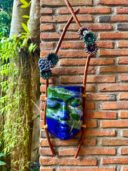 Mask w/ Flowers Wall Hang (Green & White on Blue Glaze)