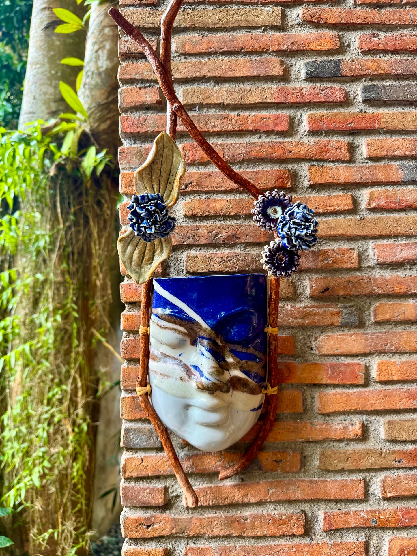Mask w/ Flowers Wall Hang (Blue & Reddish Brown on White Glaze)