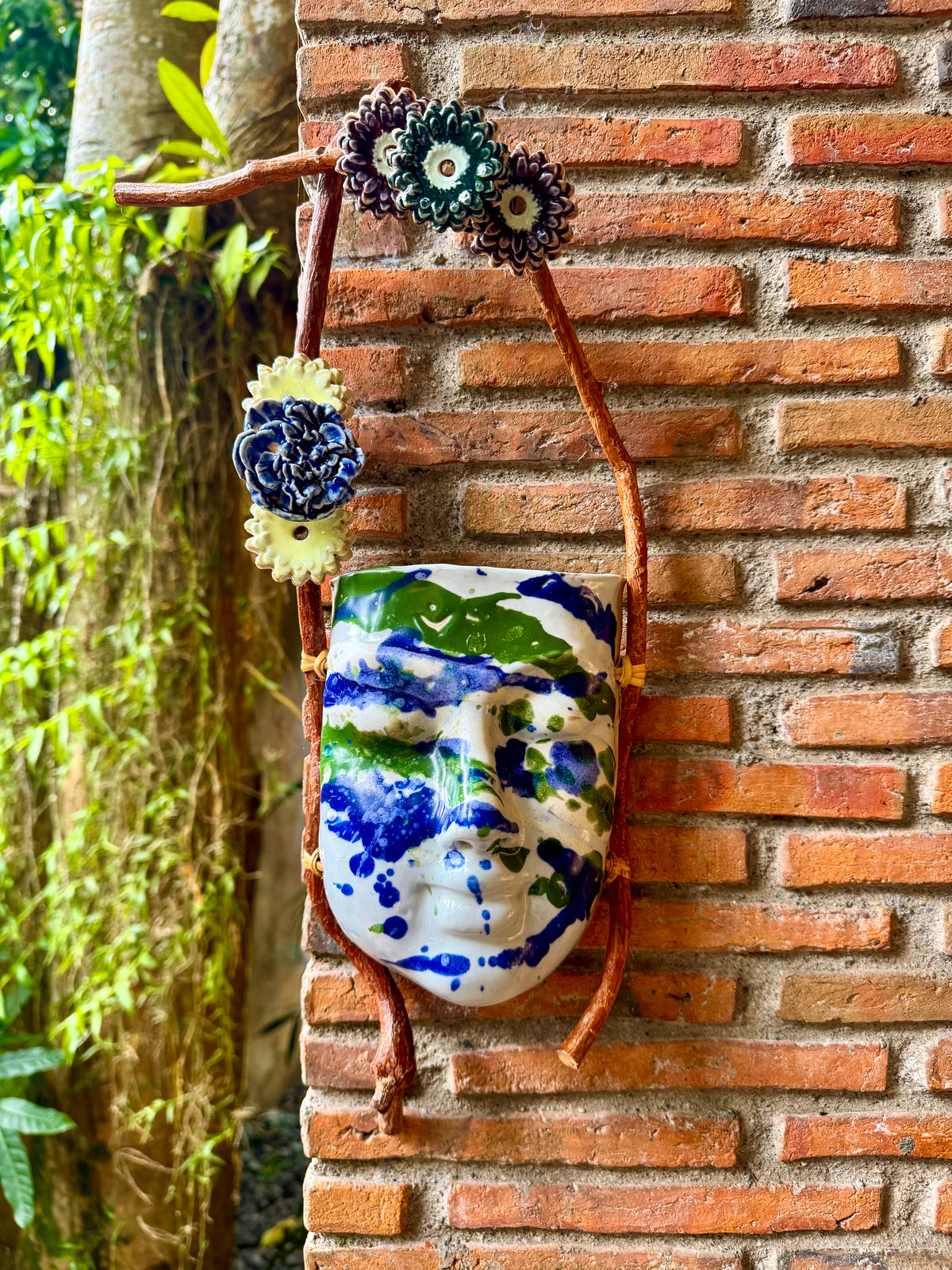 Mask w/ Flowers Wall Hang (Blue & Green on White Glaze)