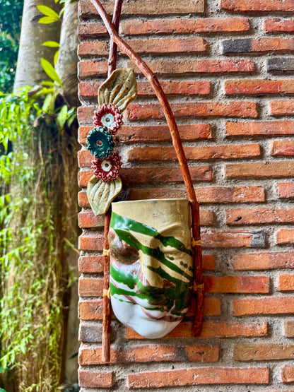 Mask w/ Flowers Wall Hang (Green & Reddish Brown on White Glaze)